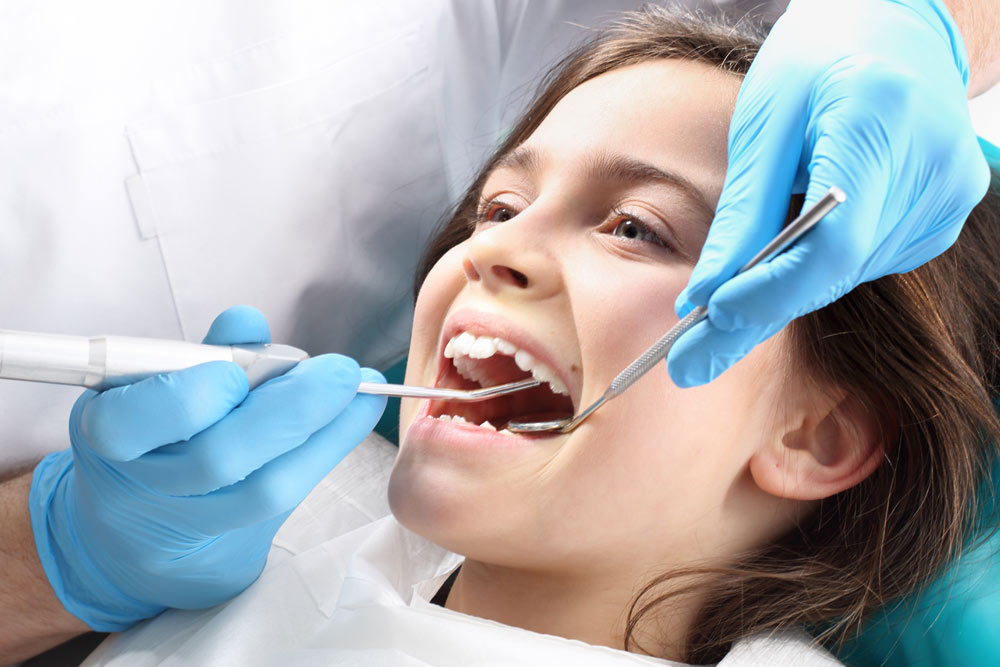 Young girl at orthodontics appointment